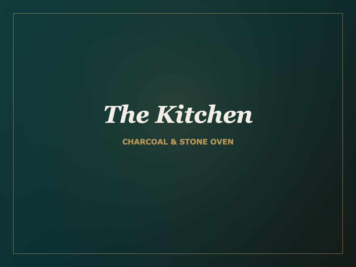 The kitchen — charcoal grill and stone oven